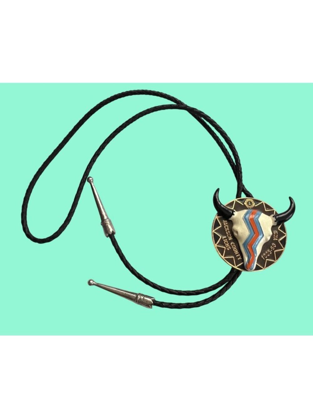 Jackson County Lions Club 50th Anniversary Bolo Tie With Braided Cord & Metal Ti